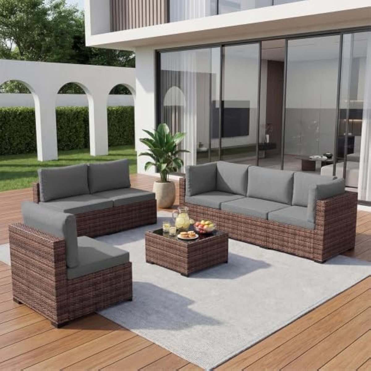 Outdoor Furniture Plus - 7-piece weather-resistant rattan patio set with